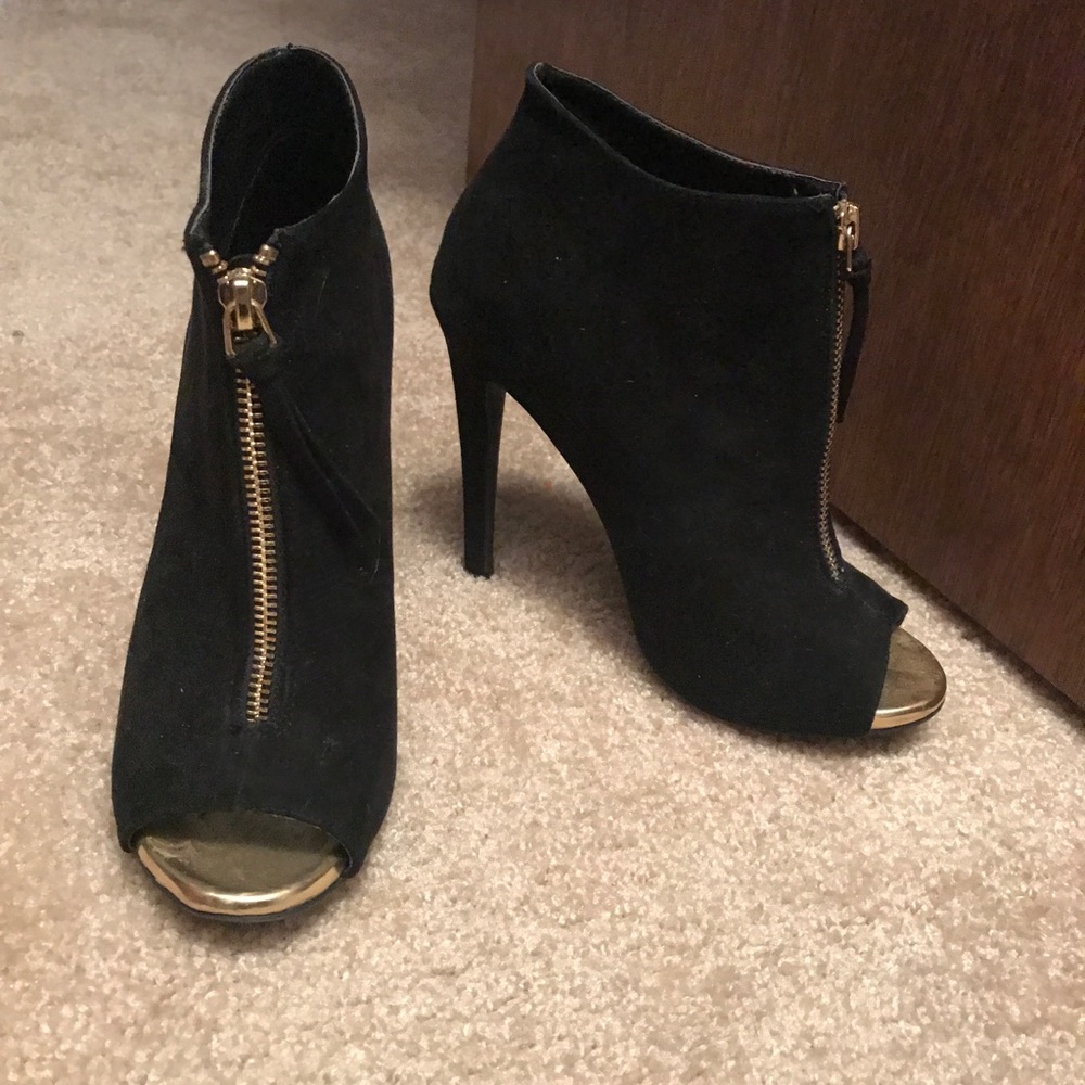 Gold and black heels
